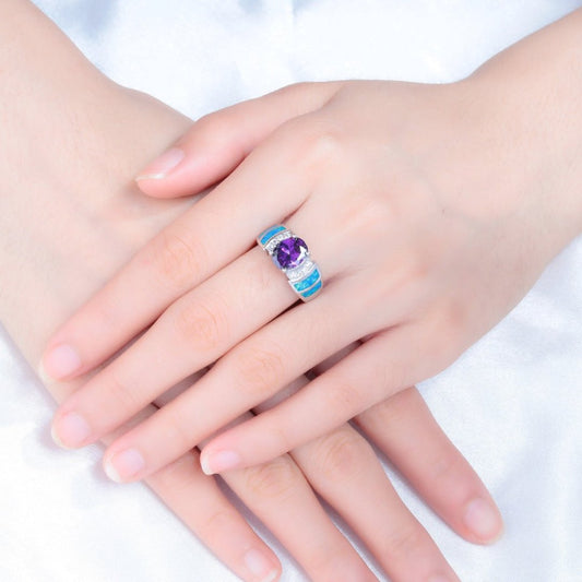 Schicker versilberter Ring mit Amethyst und blauem Opal