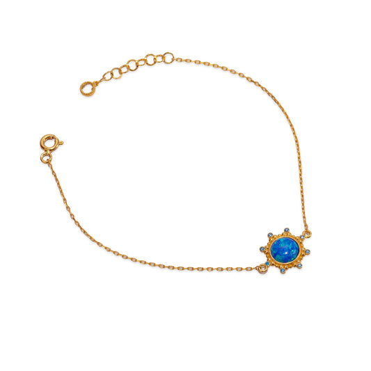 Armband aus 24 Karat Gold mit blauem Opal und Sternenlicht