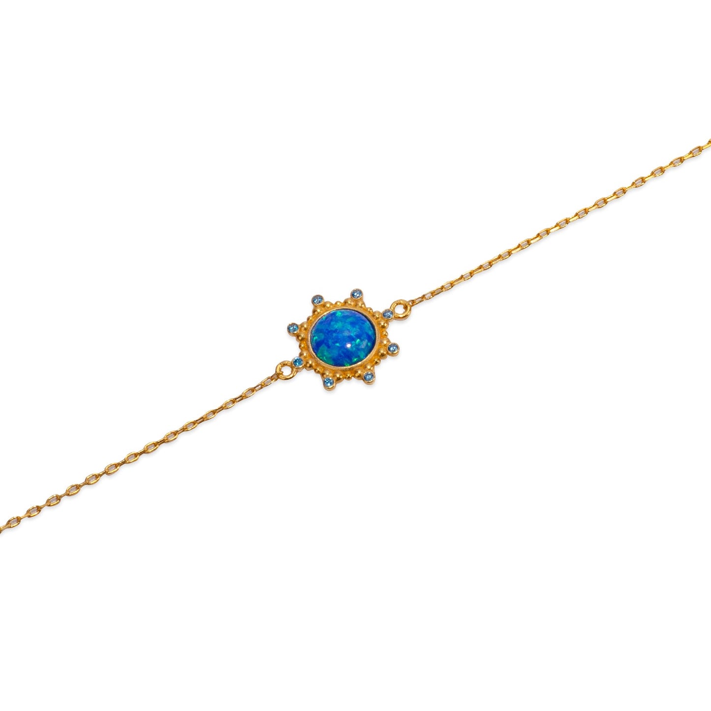 Armband aus 24 Karat Gold mit blauem Opal und Sternenlicht