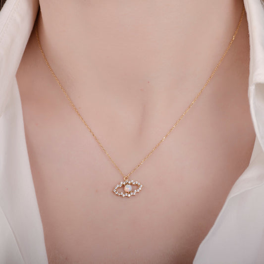 Halskette mit Opal und bösem Blick aus 24 Karat Gold